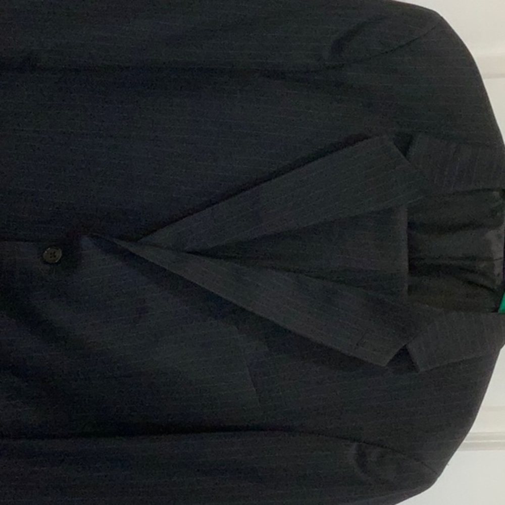 Men’s navy pinstriped suit by arrow. Size 38 x 30.